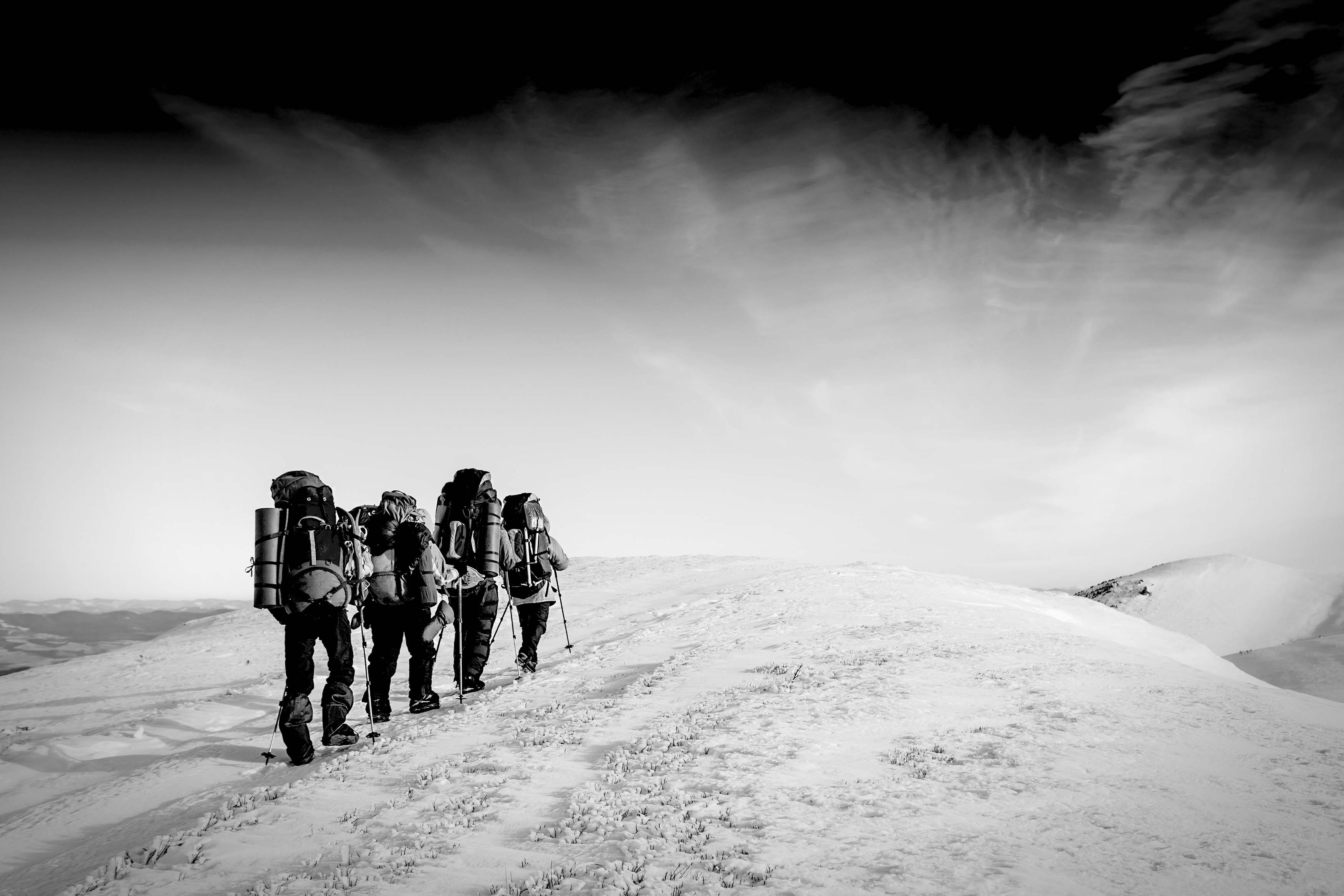 Hikers climbing together outdoors
